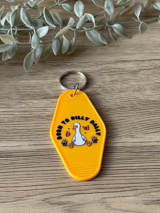 born to dilly dally motel keychain