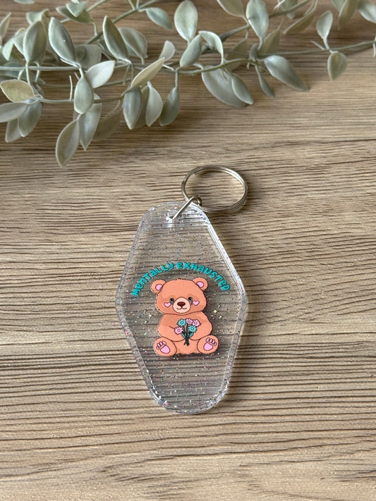 mentally exhausted teddy motel keychain