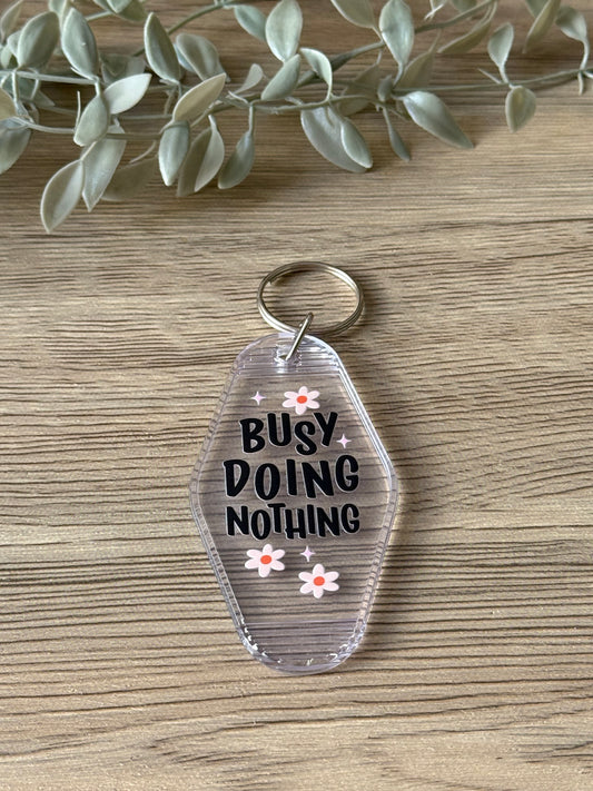 busy doing nothing motel keychain