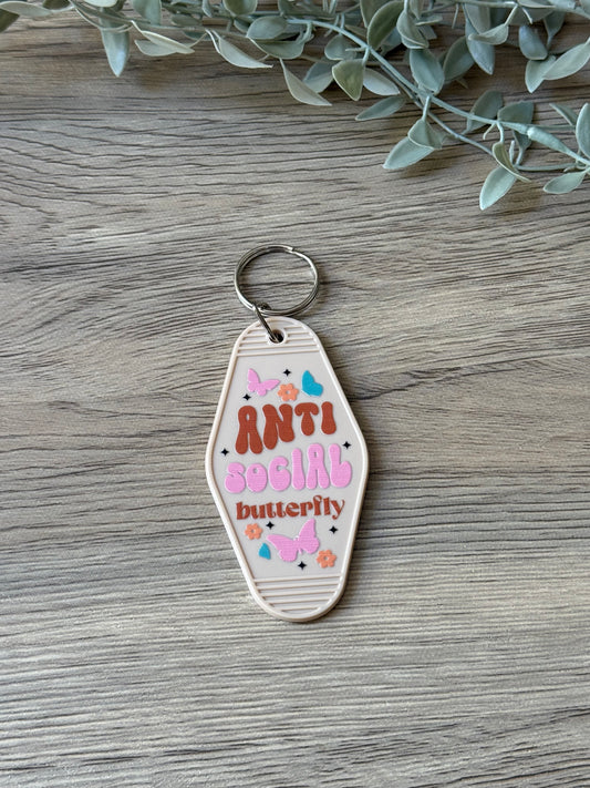 anti social butterfly motel keychain