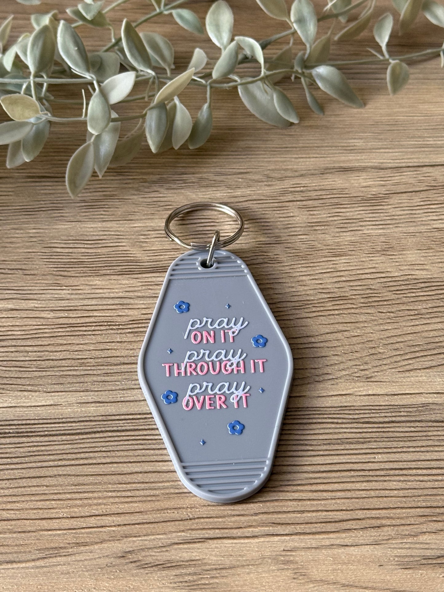 pray motel keychain