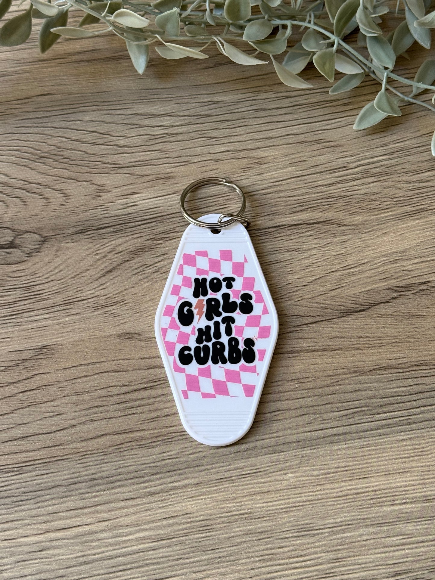hot girls hit curbs motel keychain
