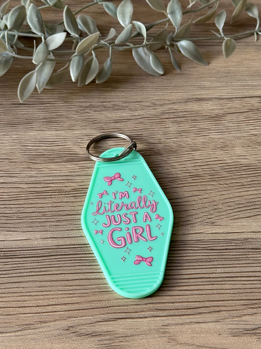 i'm literally just a girl motel keychain