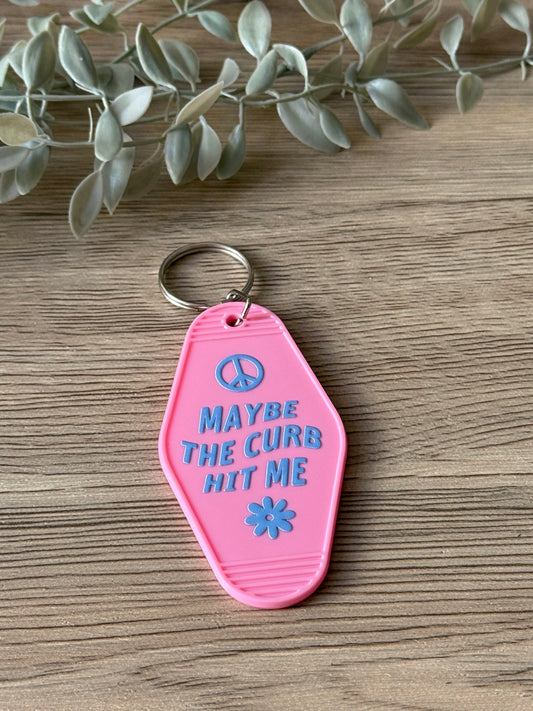 maybe the curb hit me motel keychain