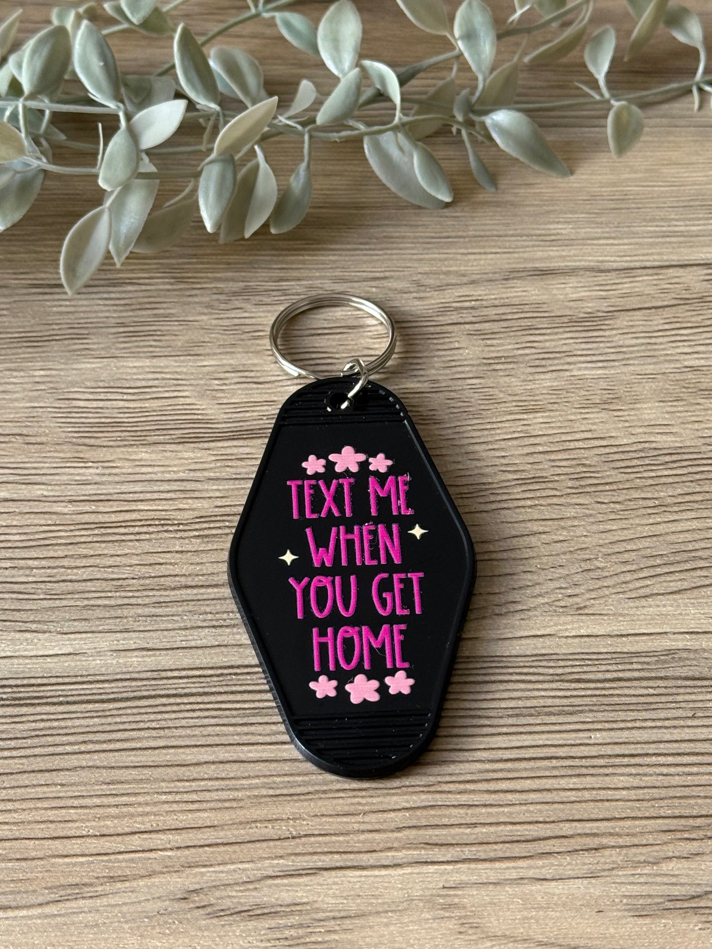 text me when you get home motel keychain