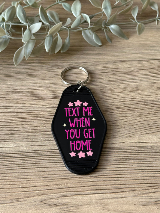 text me when you get home motel keychain