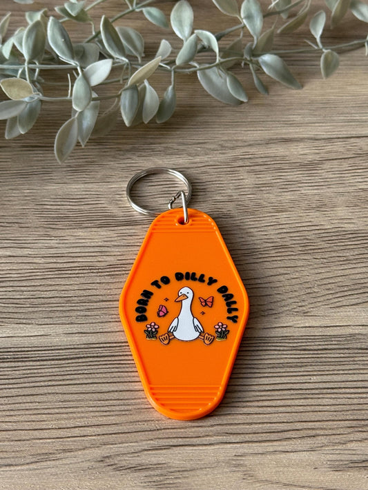 born to dilly dally motel keychain