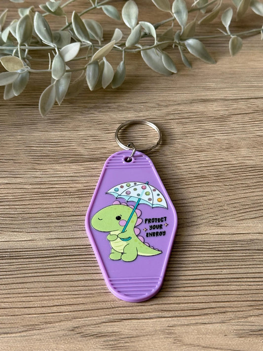 protect your energy dino motel keychain