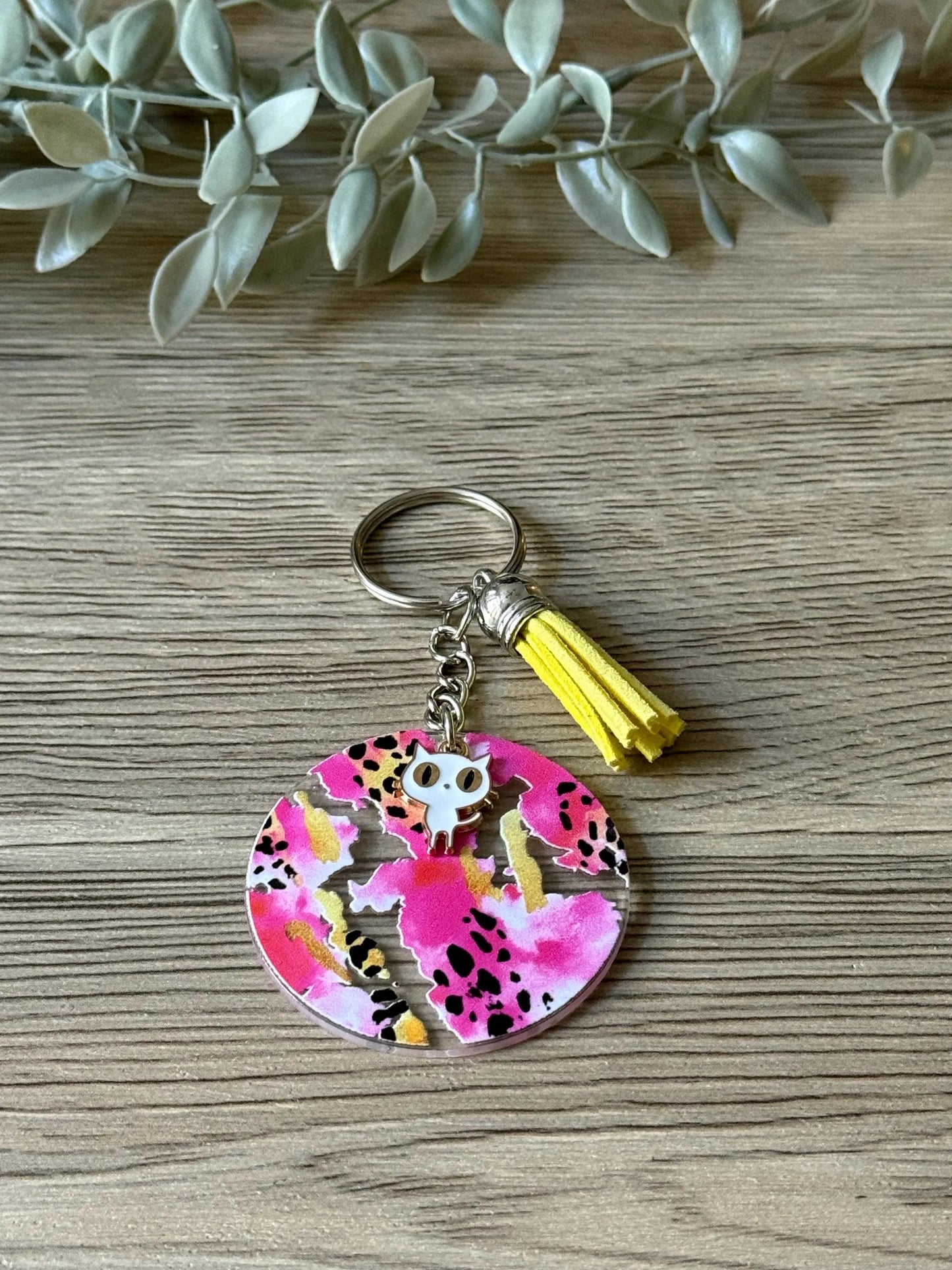 cheetah pink round keychain with tassel & charm